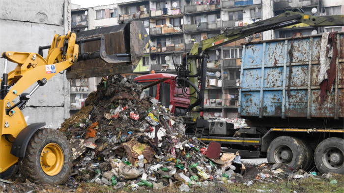 About 11,000 people live near garbage dumps