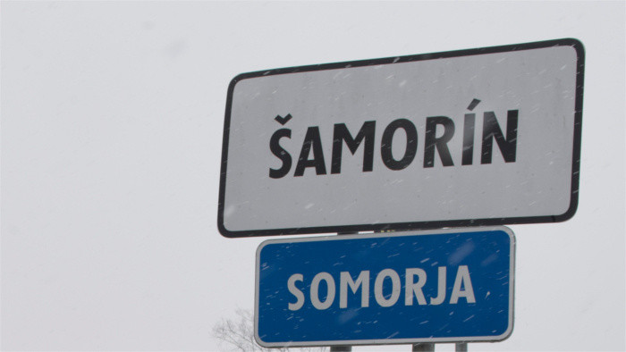 Bilingual traffic signs in mixed towns as of January